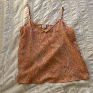 Pink spaghetti strapped light blouse. Snake print.